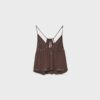 Top met bandjes en borduursels