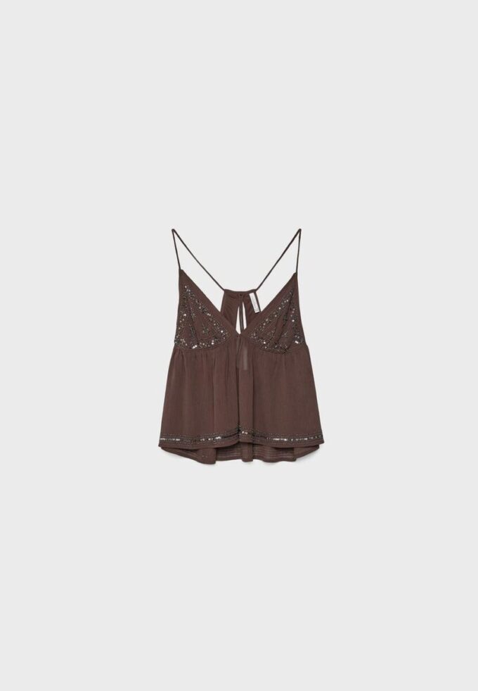 Top met bandjes en borduursels