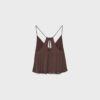 Top met bandjes en borduursels