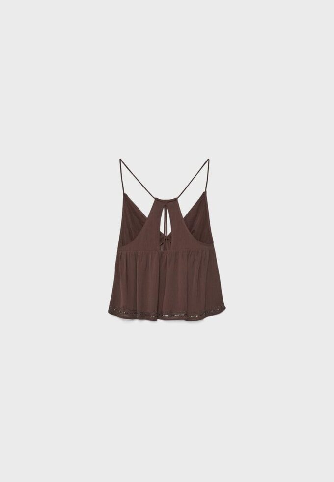 Top met bandjes en borduursels
